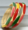 Shultz cream narrow bakelite bangles with rainbow colors of oval dots